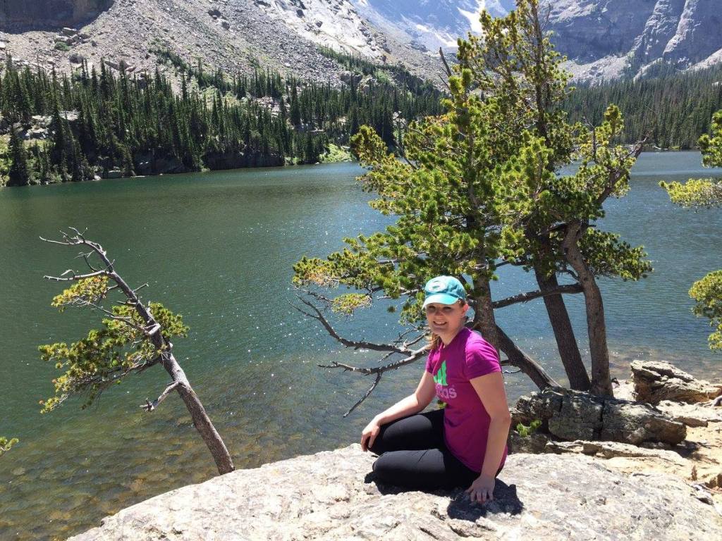 Sitting beside a lake in Rocky Mountains National Park
